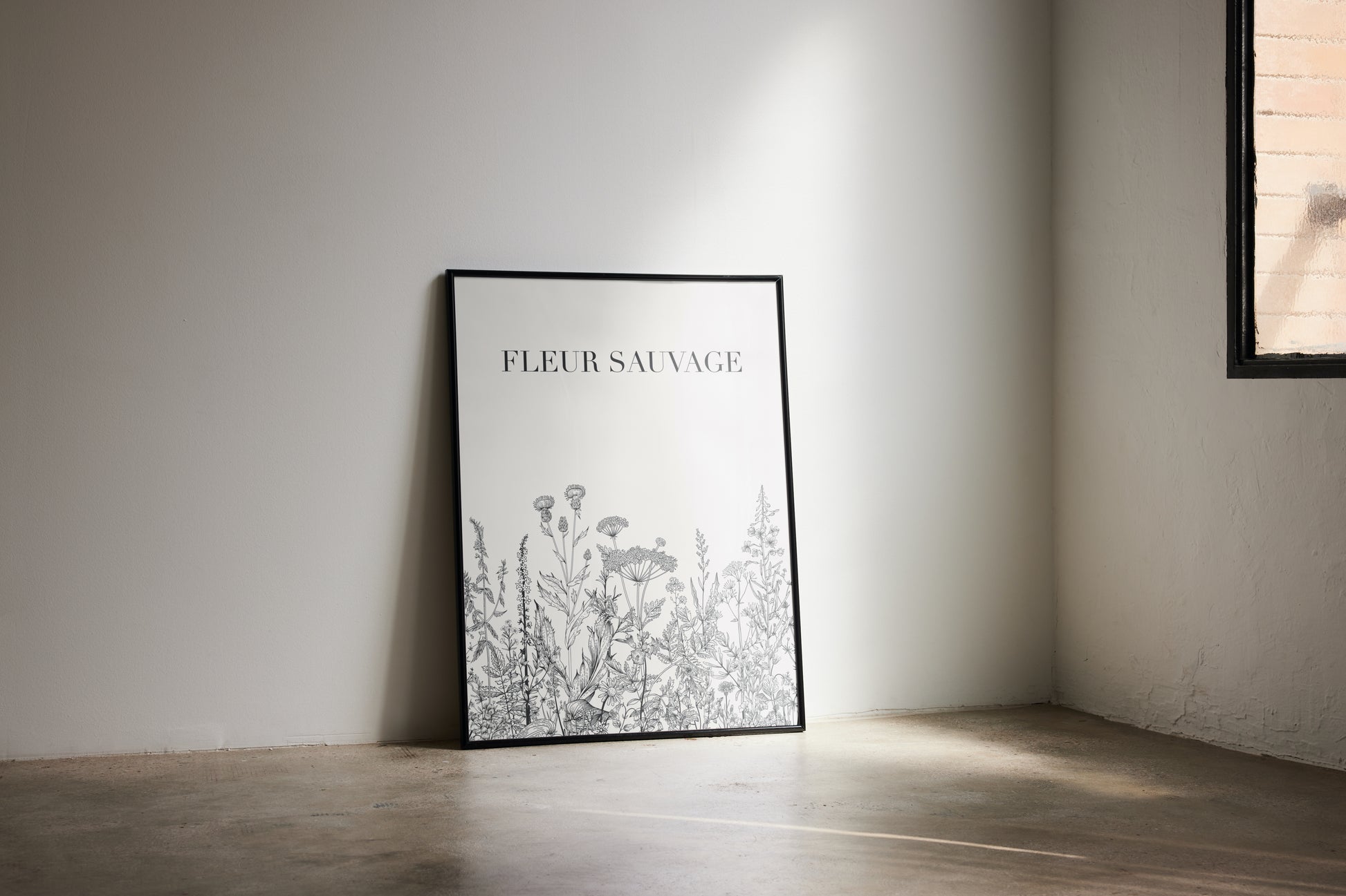 Framed artwork titled 'Fleur Sauvage' on a wall in a room with natural light.